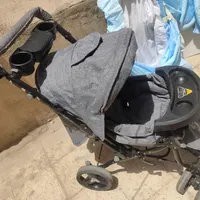 کالسکه و کریر روروئک کیف همراه با گهواره کودک