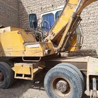 بیل مکانیکی لاستیکی هپکو اچ 100
