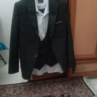 کت وشلوار وپیراهن وجلیقه