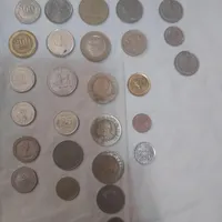 تعداد سی سکه خارجی قدیمی