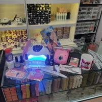 وسایل لوازم کاشت ناخن نیل با دریل تلفنی یووی سان