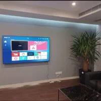 نصاب نصب تخصصی براکت دیواری تلوزیون به روی دیوار