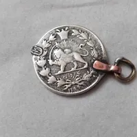 یک عدد سکه شیر وشاه سال۱۲۹۹