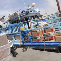 (واردات ترخیص کالا )کشتی در حال بارگیری به بندر