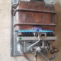 تعمیرات تخصصی انواع آبگرمکن  دیواری و پکیج در محل