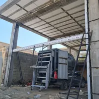 کرکره برقی درب شیشه ای آسانسور جک پارکینگی