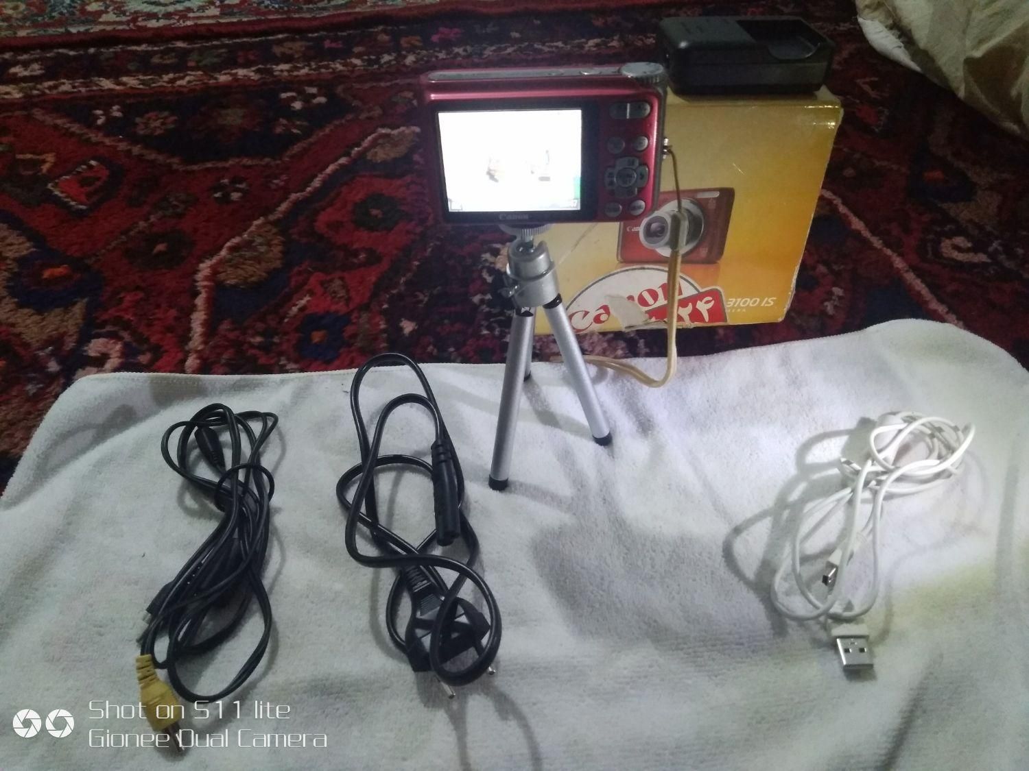 دوربین کنون قرمز رنگ مدل ۳۱۰۰ lS|دوربین عکاسی و فیلم‌برداری|تهران, شهرک طالقانی|دیوار