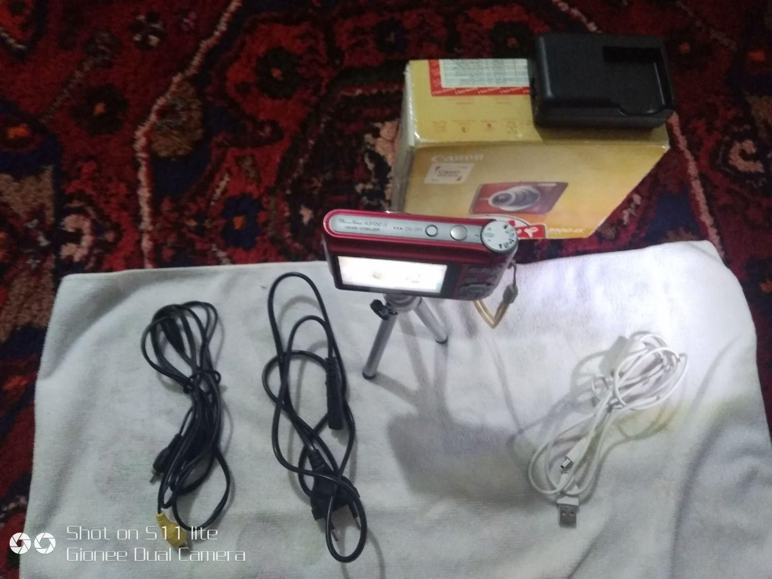 دوربین کنون قرمز رنگ مدل ۳۱۰۰ lS|دوربین عکاسی و فیلم‌برداری|تهران, شهرک طالقانی|دیوار