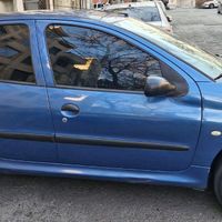 پژو ۲۰۶ تیپ پنج مدل ۱۳۹۰ رنگ آبی متالیک|خودرو سواری و وانت|تهران, تسلیحات|دیوار