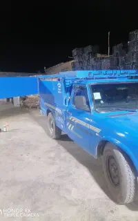 حمل بار با نیسان با کار گر