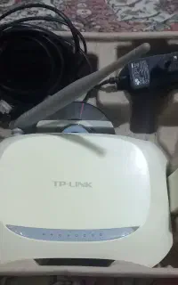 یک عدد  مودم  .TP.LINK.