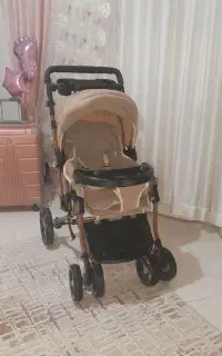 کالسکه دلیجان رنگ زیبای کرم بسیار نو