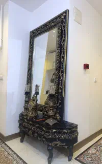 آینه شمعدان و ساعت