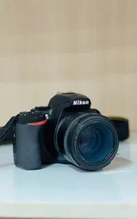 دوربین نیکونD 5600 به همراه  لنز