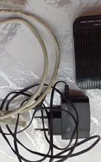 یه عدد مودم با کابل