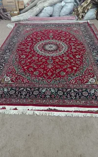 فرش قرمز گلی