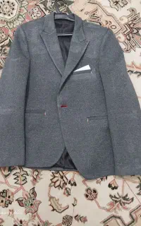 یک عدد کت و شلوار و کفش مجلسی
