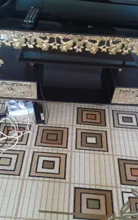 زیر تلوزیونی ساعت ایستاده برنز