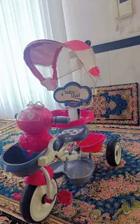 سه چرخه موزیکال چتر دار