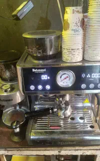 اسپرسو ساز دلمونتی و یک آسیاب
