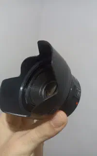 لنز کنون 50mm f1.8 STM به همراه هود