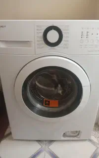 ماشین لباسشویی خشک کن بست