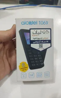 گوشی دکمه ای الکاتل