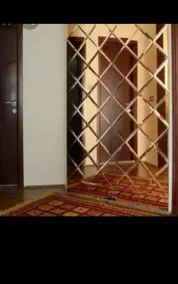 اجرای ایینه دکوراتیو دیوار لمسه ایینه دفرمه