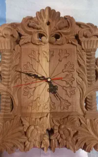 ساعت دیواری چوبی دست ساز منبت کاری شده