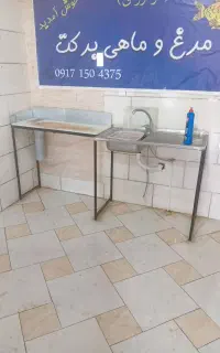 سینک و تخته گوشت مرغ خرد کنی