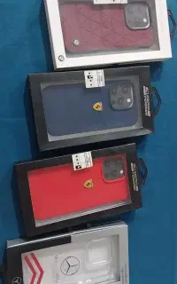 تعدادی قاب موبایل(آیفون و سامسونگ) در کف قیمت