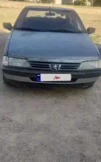 ماشین پژو روا مدل ۸۷ دوگانه سوز دستی خاکستری رنگ