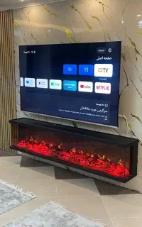 شومینه برقی سه طرفه با فریم فلزی و چوب طبیعی