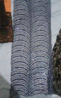 تعدادی پارچه خرج کار لباس