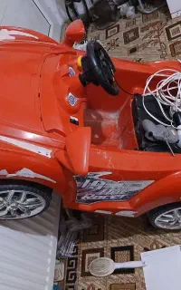 ماشین شارژی قرمز رنگ