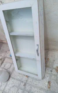 ویترین کتابخانه وساعت دیواری خودکار قوچان