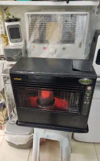 بخاری نفتی برقی ژاپنی حرفه ای ۹۵متر گرمایش