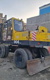 بیل مکانیکی اطلس 1304 و هپکو 912 لاستیکی