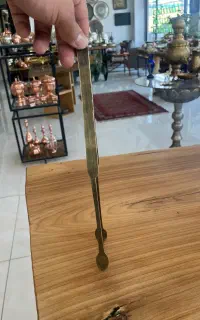ماشه برنجی کهنه