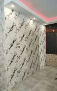 نصب کاغذ دیواری و اجرای تی وی ست