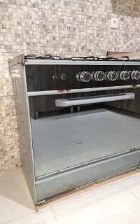 فروش اجاق گاز و میز تلویزیون دست ۲