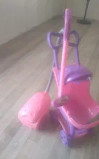 کالسکه و جاروبرقی کودک