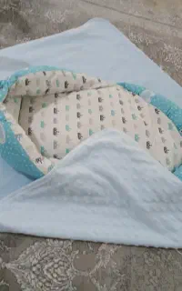 حوله همراه آغوشی نوزادی