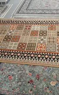 یک فرش ۱۲ متری و یک گلیم فرش