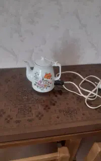 قوری برقی مسافرتی جنس  چینی