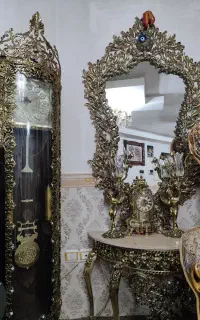 آینه شمعدان و ساعت