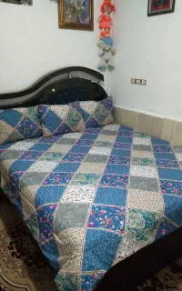 تخت و خوشخواب و آینه کمد