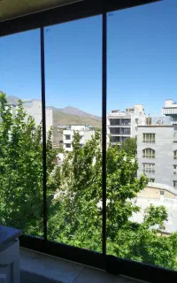 اجرای بالکن شیشه‌ای تاشو و کشویی