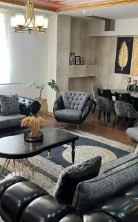 مبل چستر چرم ترک و میز غذا خوری و