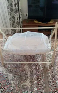 گهواره ضد کولیک و رفلاکس